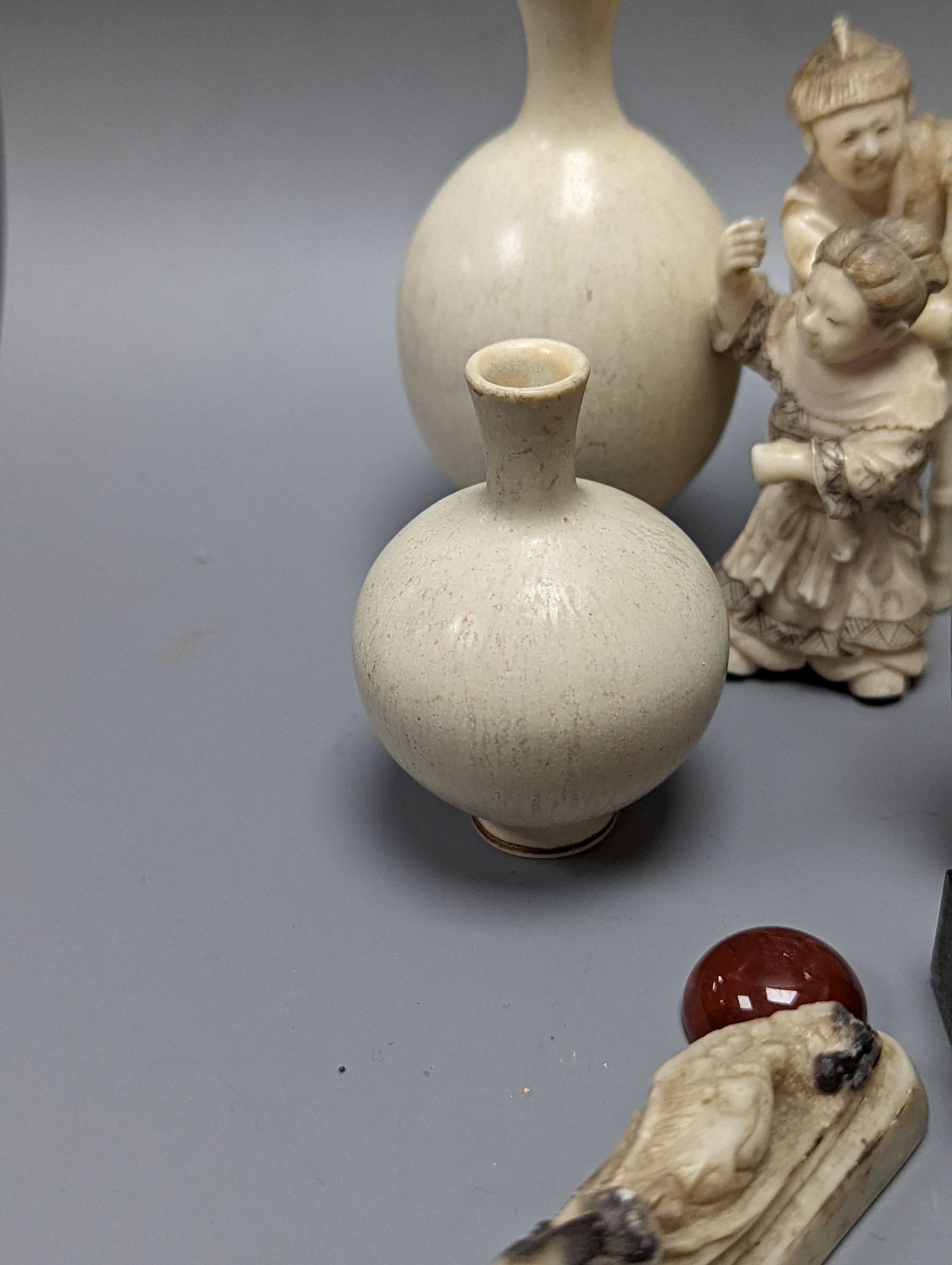 A group of Oriental ivory, inside-painted snuff bottle, soapstone carvings, etc. (14)